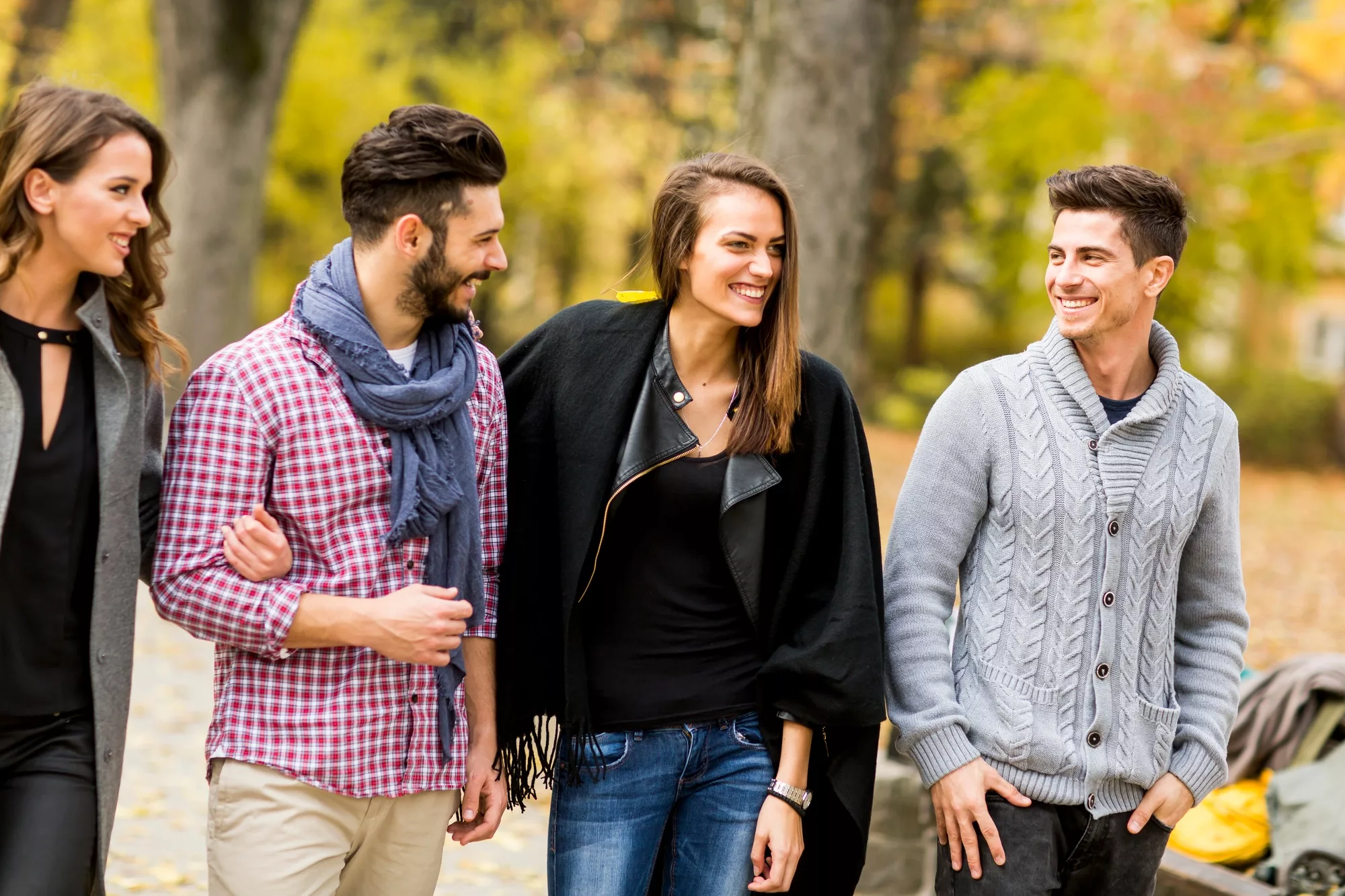 Young people in the autumn park